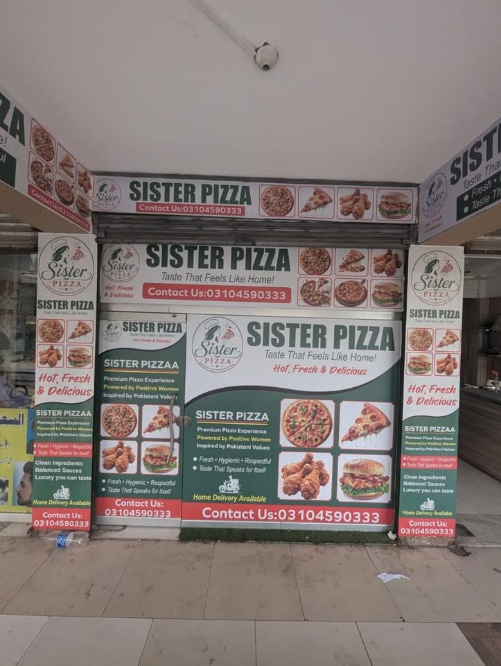 Sister Pizza storefront with branded signage in Korang Town, Islamabad