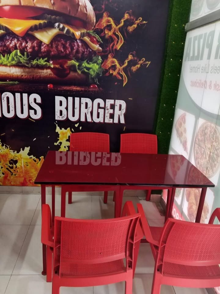 Family seating area inside Sister Pizza